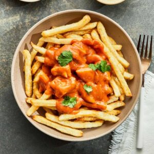 BUTTER CHICKEN POUTINE